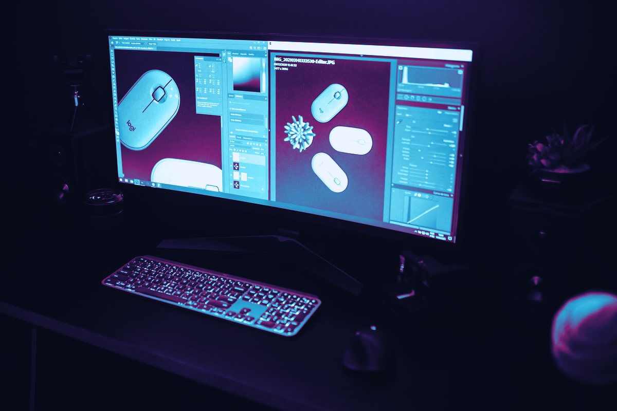 Cyan and magenta light banding across a dark cobalt surface