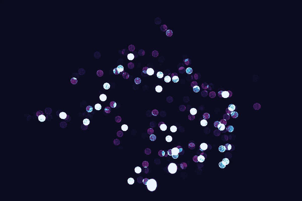 A field of glowing pins with one bright streak falling through it